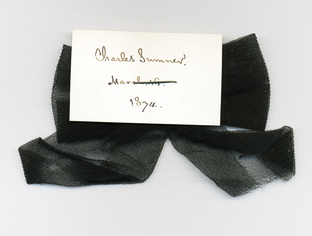 A mourning ribbon worn by Henry W. Longfellow at Senator Charles Sumner's funeral.