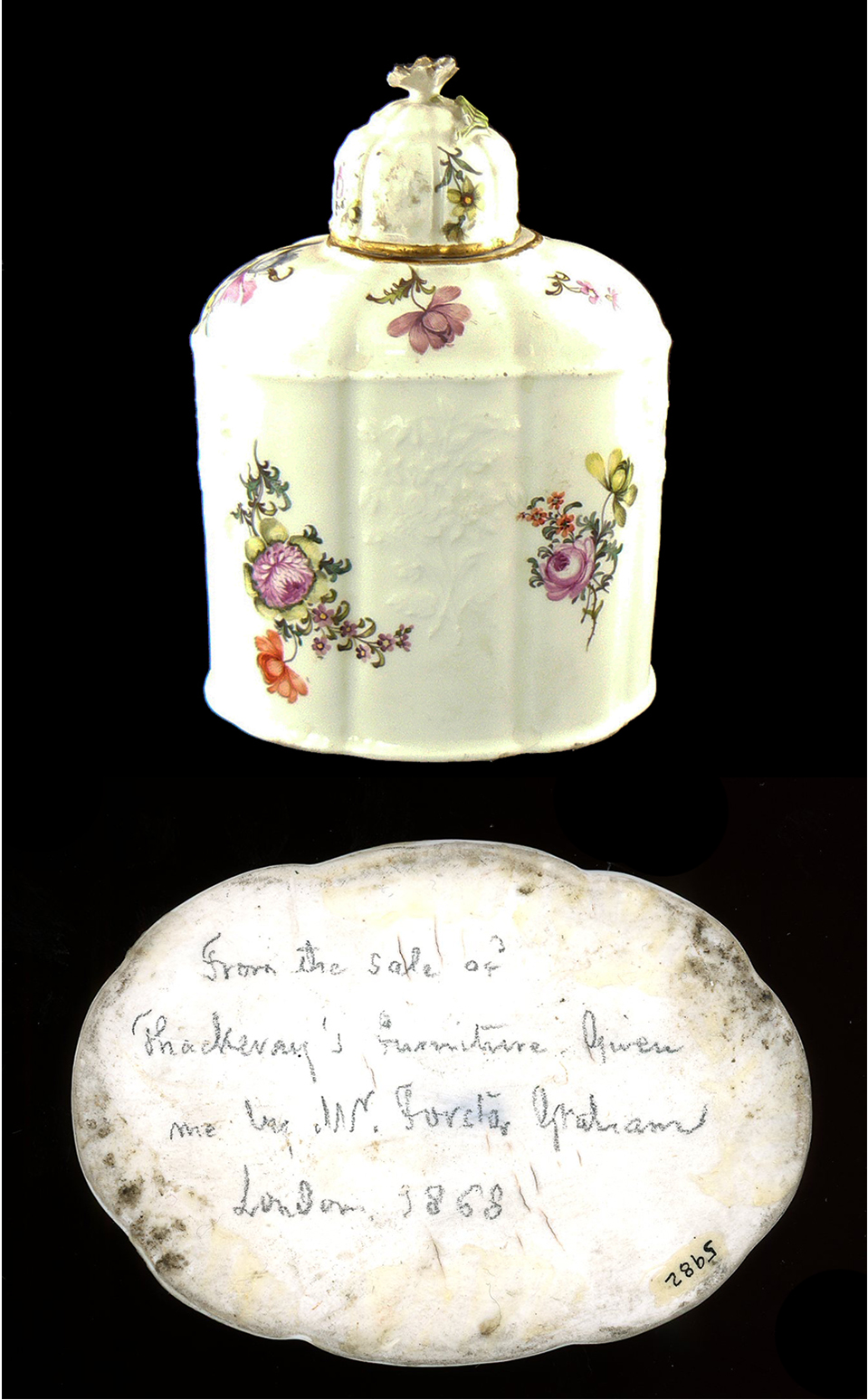 A white porcelain tea caddy with floral decoration and a domed lid with gilt edging.