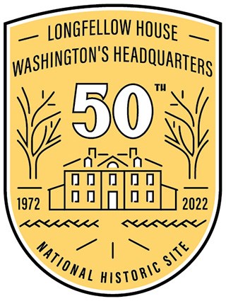 logo in shape of badge with yellow background, line drawing of house flanked by trees and above large 50