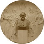 Photograph of bust of Henry Longfellow in front of relief figures of characters from his works