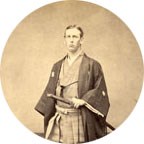 sepia toned historic portrait of a man wearing Japanese robes