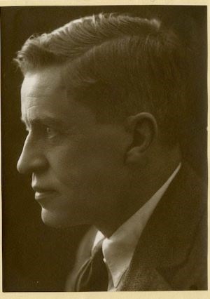 Sepia toned photograph of a young man in profile