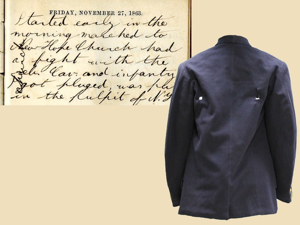 Bottom right corner of image shows a Civil War uniform jacket in navy blue wool. Two holes - entry and exit points – are below the shoulder blades. Top left corner of image shows an inset journal entry, dated Friday, November 27, 1863