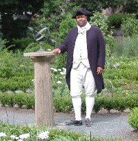 Colonial reenactor in the Longfellow gardens. Colonial reenactor in the Longfellow gardens.