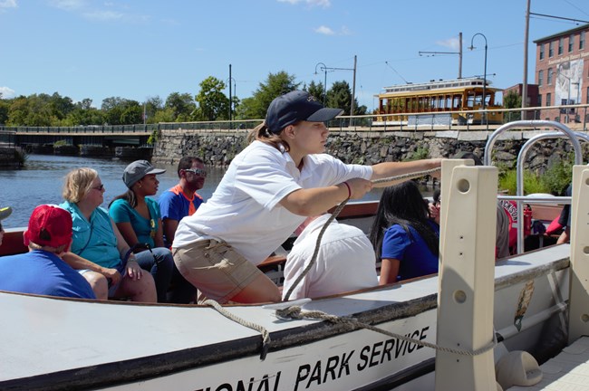 A first mate ties off a boat