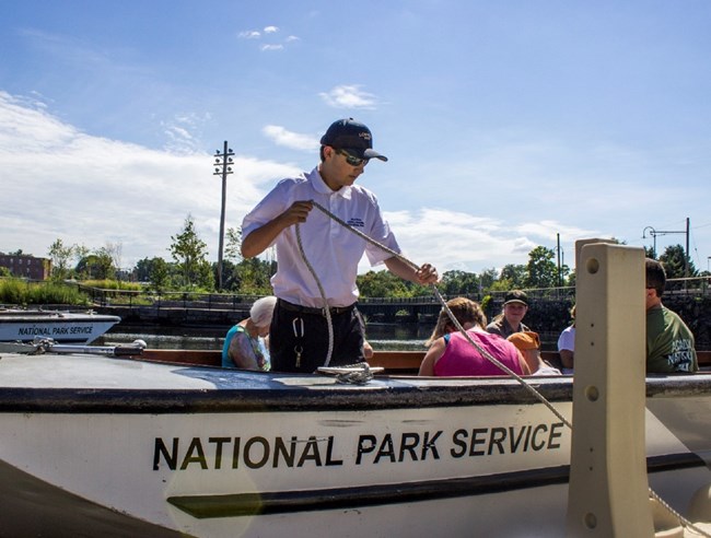 A first mate ties off a boat