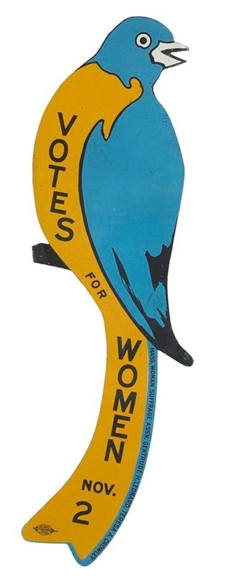 A blue bird. The bird's yellow belly reads in vertical text "Votes for Women November Second"
