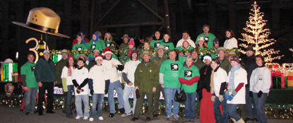 Lowell National Historical Park volunteers and staff with holiday float