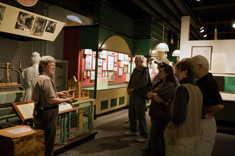 Ranger talk at the Boott Cotton Mills Museum Park ranger talks to visitors in the museum of the Boott Cotton Mills Musem.