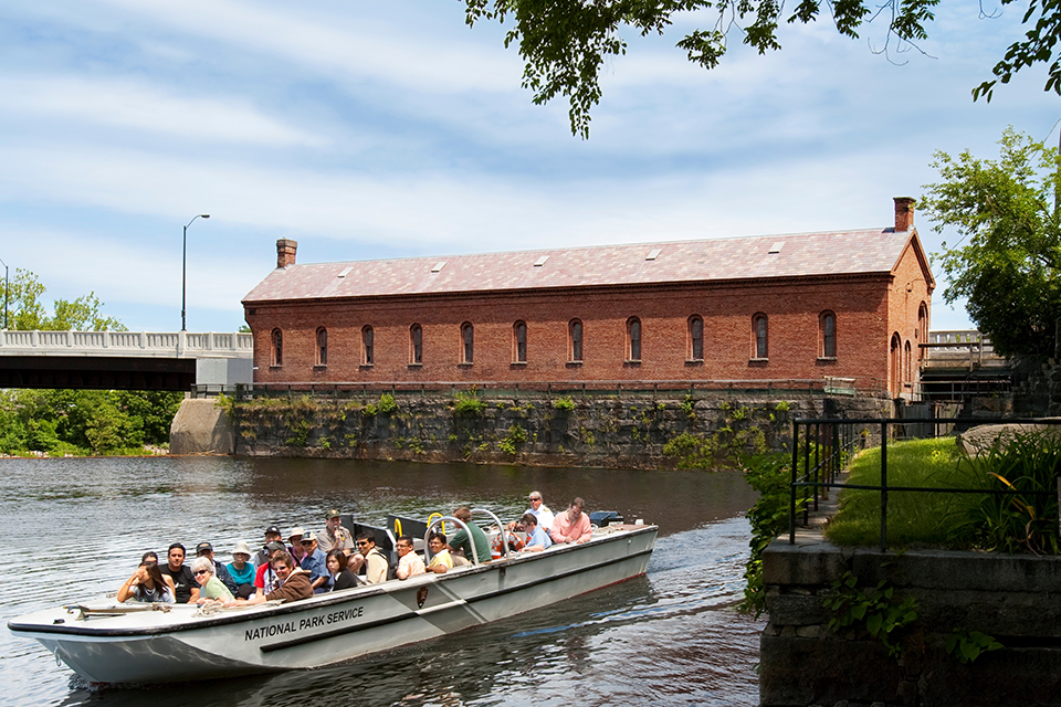 Canal boat tour Canal boat tour in Lowell with gatehouse in background