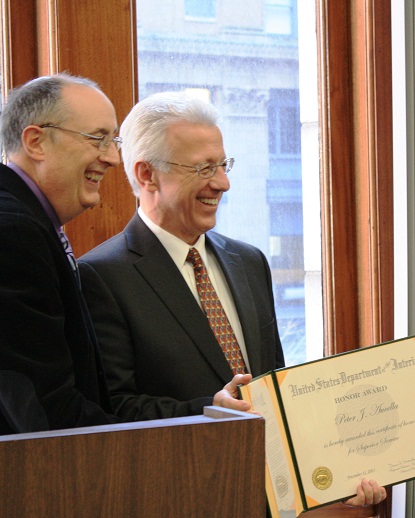 Northeast Regional Director Dennis Reidenbach (left) and Assistant Superintendent Peter Aucella with Superior Service Award.