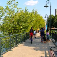 Visitors enjoying walkways along the canals and river