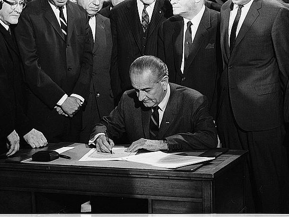Civil Rights Bill President Johnson signs Civil Rights Bill