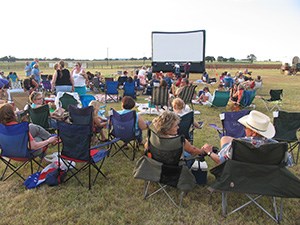 Visitors enjoying a movie at the LBJ Ranch.