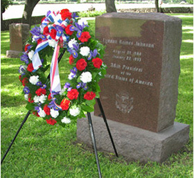 A wreath at the headstone of President Johnson's grave.