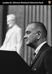 President Johnson with Lincoln statue in background.