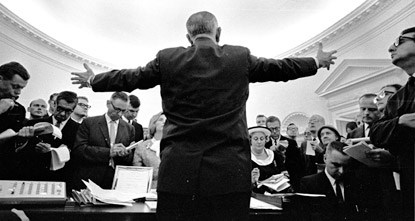 President Johnson faces the press in the Oval Office