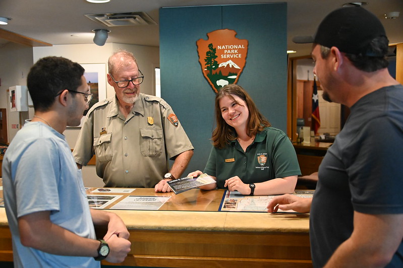 Park rangers providing information to visitors