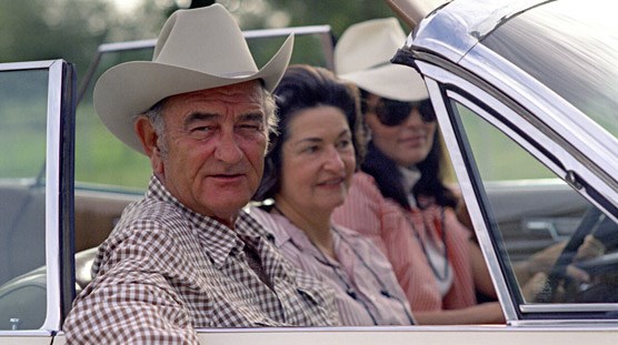 President and Mrs. Johnson are passengers in their Lincoln