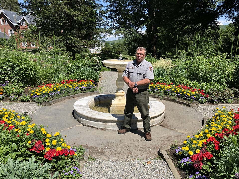 Kim Murray standing in formal garden Kim Murray stands in formal garden