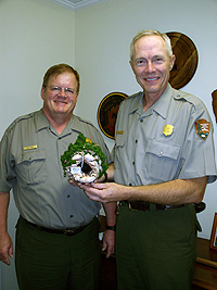 Superintendent Patrick Reed and Ranger John Yakel with Mammoth Cave NP Christmas Ornament