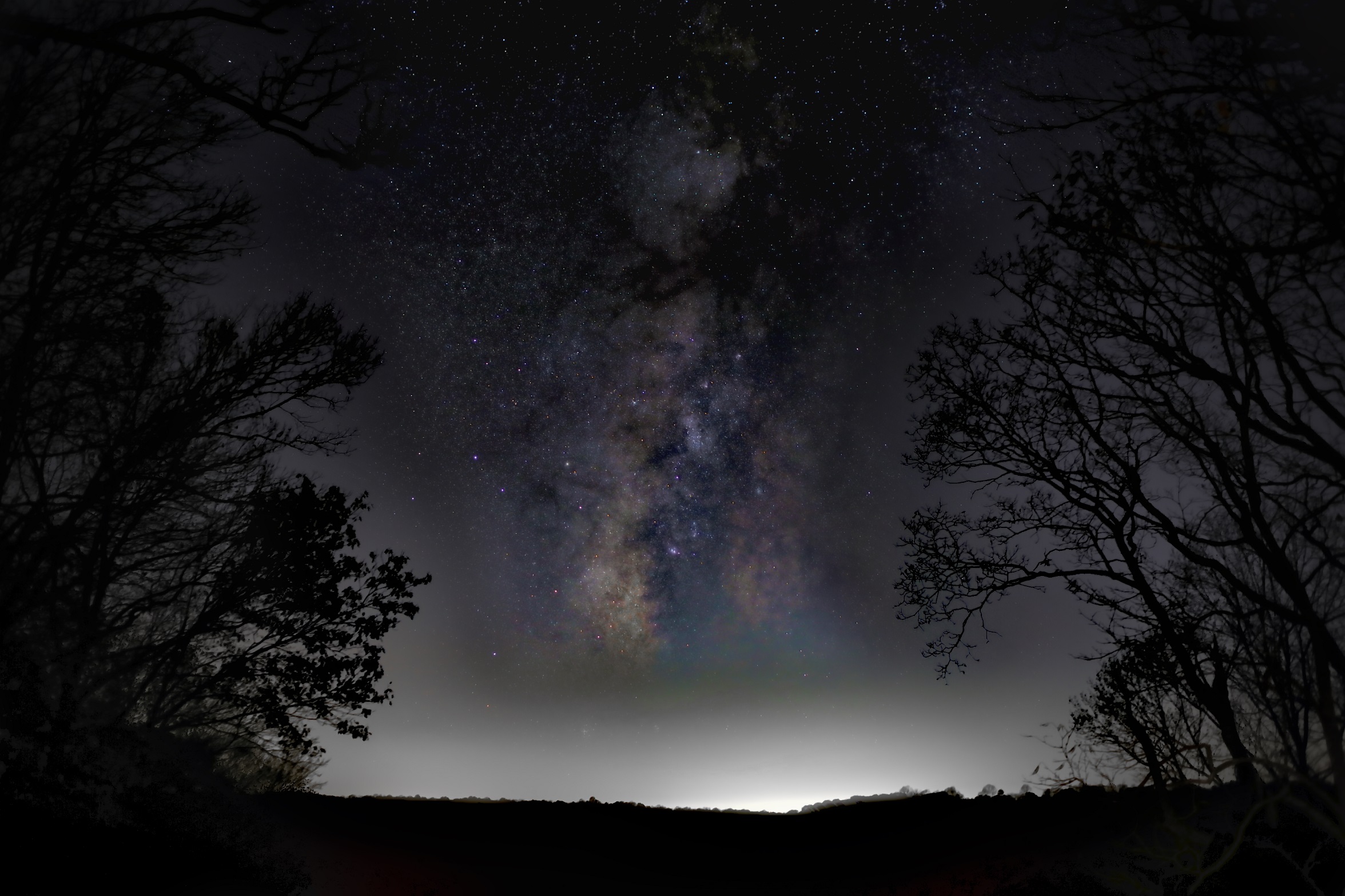 Thousands of stars and the cloudy Milky Way Galaxy seen in a dark night sky from Sunset Point in Mammoth Cave National Park. Thousands of stars and the cloudy Milky Way Galaxy seen in a dark night sky.