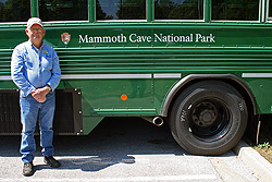 Concessions bus driver with new propane-powered tour bus