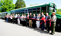 Group photo with new propane-powered tour bus