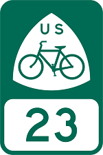 A green road sign for USBR 23