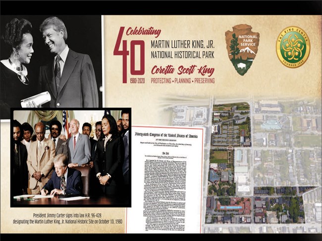 President Carter signing the park legislation with Mrs. King looking on