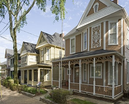 Row of Queen Anne homes.