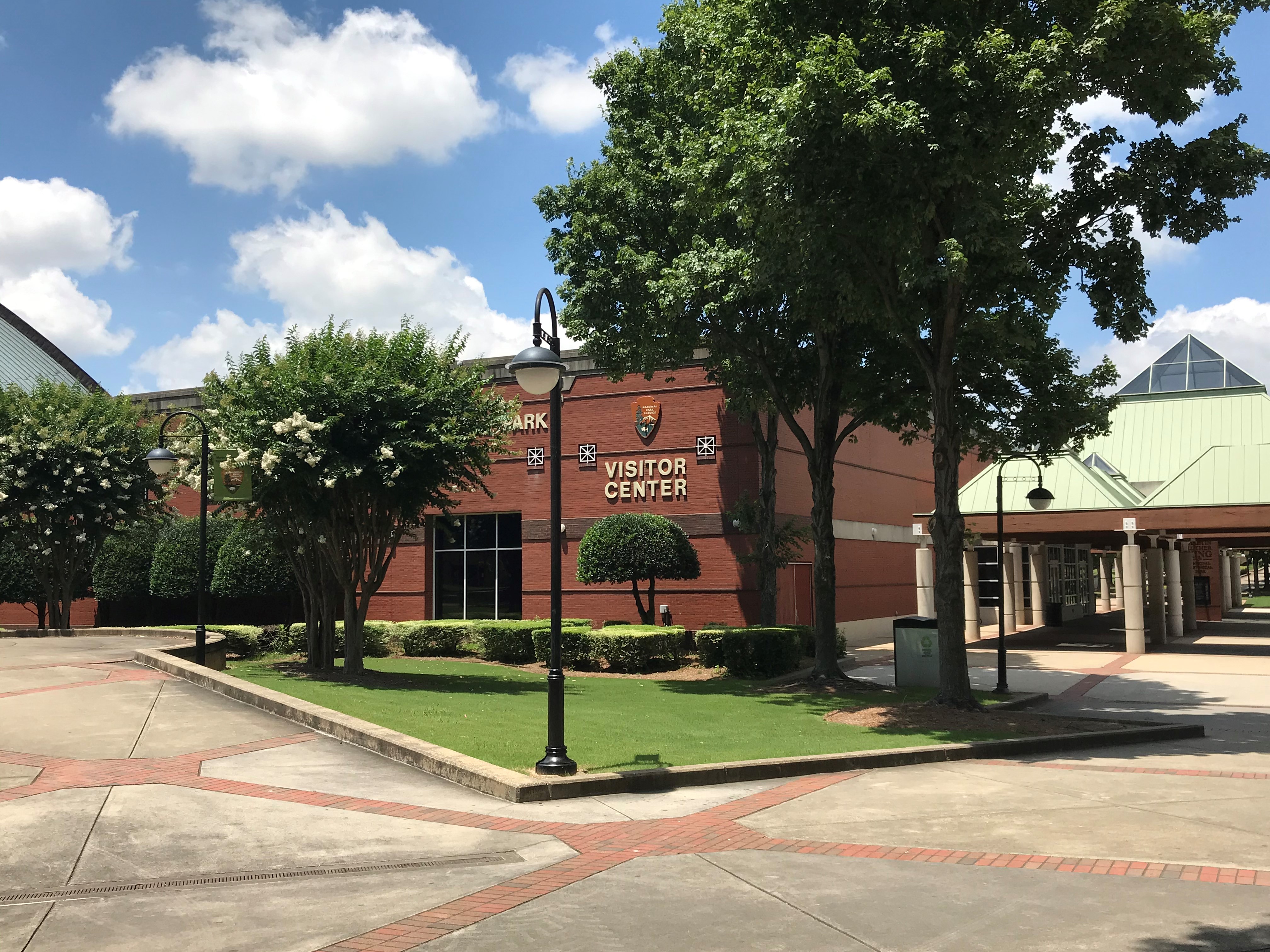 visitor center - a two-story red brick building