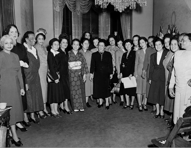 H. Elsie Austin and other NCNW members with a delegation of Japanese women at the Council House