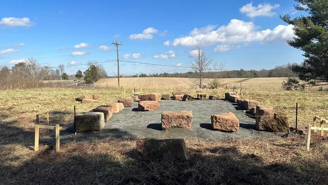Redman Blacksmith Shop site in an open  grassy field