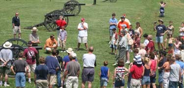 Ranger Jim Burgess leading a tour along Ricketts' Battery. Ranger Jim Burgess leading a tour along Ricketts' Battery.