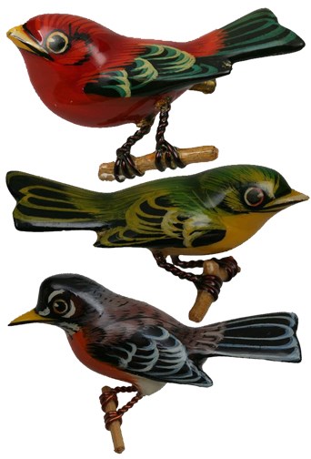 Red, green and blue wooden bird pins