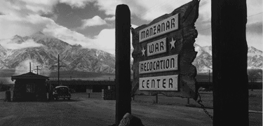 Wooden Sign at Entrance to Manzanar War Relocation Center. Photo by Ansel Adams.