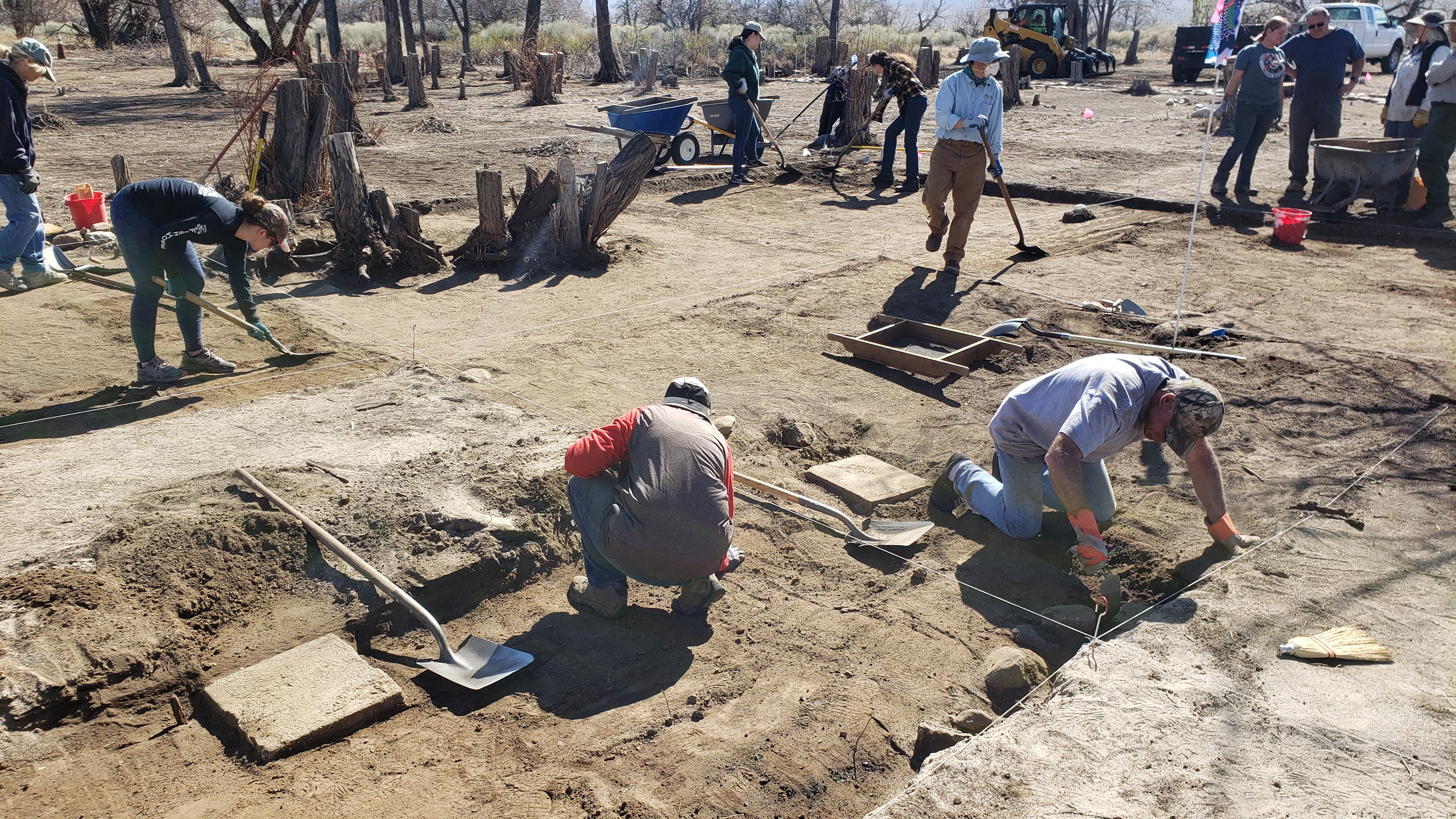 volunteers digging during Manzanar archeology program