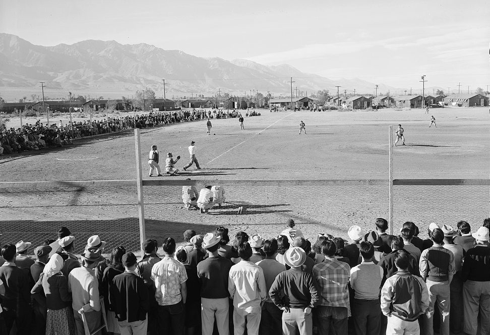 black and white photo of a baseball game