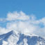 Clouds building over snowy peaks Clouds building over snowy peaks