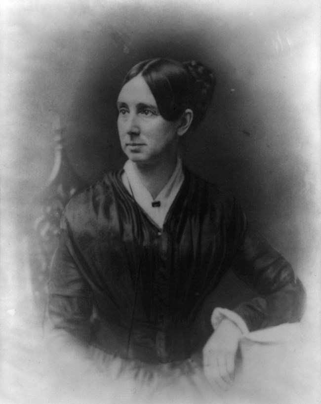 Dorothea Dix, seated in a chair.