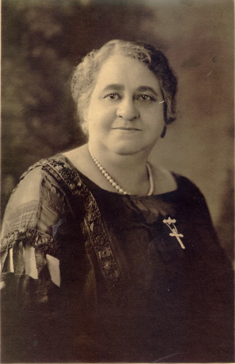 Portrait of Maggie L. Walker A black and white portrait of a well dressed African American woman in the early 20th century.