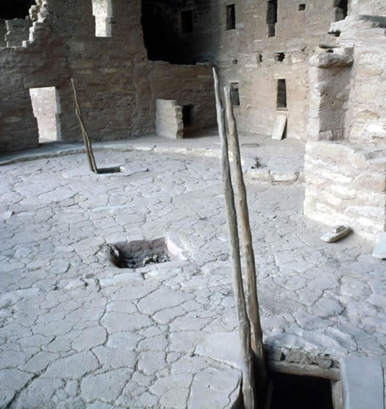Cliff dwelling courtyard with kiva entrances Cliff dwelling courtyard with kiva entrances
