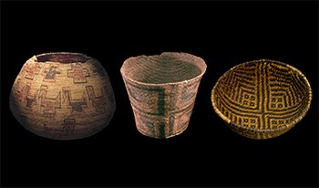 There ancient baskets one round, one tall, and one bowl-like. All are woven with tan, plant material with back and red geometrical designs.