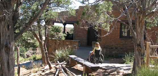 Visitor on way to Spruce Tree House Overlook