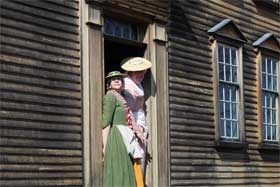 Colonial women at Barrett Farm await the British