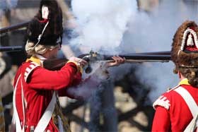 British Grenadier fires his musket British Grenadier fires his musket