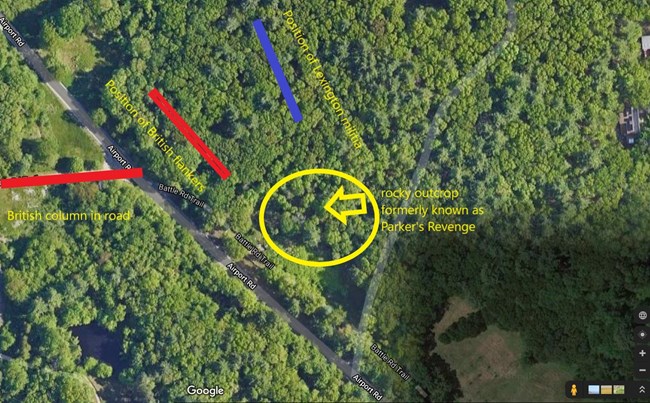 Aerial photo showing a wooded landscape with a historic road cutting through it. Rectangles and text show positions of troops. 