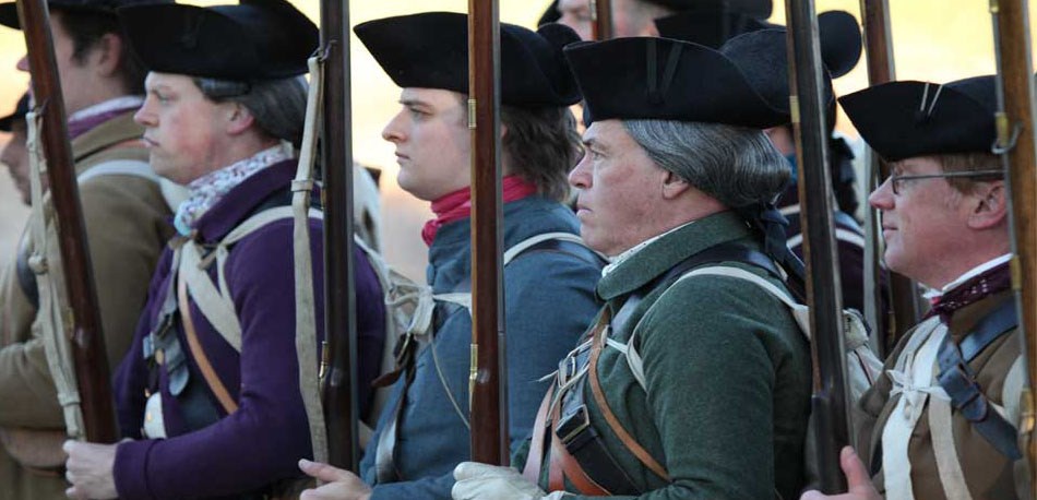 NPS volunteers portray a 1775 minute company NPS volunteers portray a 1775 minute company