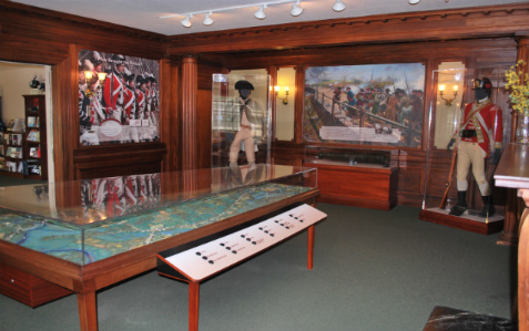 Exhibit case and interpretive panels at the North Bridge Visitor Center, Minute Man National Historical Park.